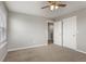 This bedroom features carpet and access to the closet at 2248 Rosette Ln, Castle Rock, CO 80104