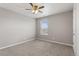 Bright bedroom with soft carpet and a ceiling fan at 2248 Rosette Ln, Castle Rock, CO 80104