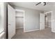 Light-filled room with neutral decor has access to a closet and doorway to the rest of the house at 2248 Rosette Ln, Castle Rock, CO 80104