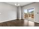 Dining area with sliding glass door leading to the outdoor deck at 2248 Rosette Ln, Castle Rock, CO 80104