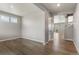 Spacious living room with wood floors and ample natural light at 2248 Rosette Ln, Castle Rock, CO 80104