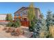 Landscaped backyard with wooden fence and pergola at 2388 W 165Th Pl, Broomfield, CO 80023