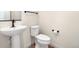 Clean and modern bathroom with pedestal sink and toilet at 2388 W 165Th Pl, Broomfield, CO 80023