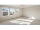 Bright bedroom with neutral walls, carpet, and large windows at 2388 W 165Th Pl, Broomfield, CO 80023