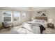 Spacious bedroom with large windows, a comfortable bed, and natural light at 2388 W 165Th Pl, Broomfield, CO 80023