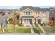 Two-story home with attached pergola and landscaped yard at 2388 W 165Th Pl, Broomfield, CO 80023