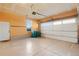 Attached garage with epoxy floor and plenty of storage space at 2388 W 165Th Pl, Broomfield, CO 80023