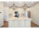 Modern kitchen with island, stainless steel appliances, and light-colored cabinetry at 2388 W 165Th Pl, Broomfield, CO 80023