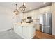 Modern kitchen with island and stainless steel appliances at 2388 W 165Th Pl, Broomfield, CO 80023