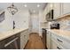 Modern kitchen with stainless steel appliances and light-colored cabinetry at 2388 W 165Th Pl, Broomfield, CO 80023
