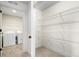 Convenient laundry room with washer, dryer, and ample shelving at 2388 W 165Th Pl, Broomfield, CO 80023