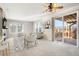 Living room with fireplace, deck access and plenty of natural light at 2388 W 165Th Pl, Broomfield, CO 80023
