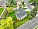 The home features solar panels and a sprawling green lawn, adding to its energy efficiency and curb appeal at 9642 Meade Ct, Westminster, CO 80031