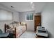 Bedroom features carpet flooring, window view, and versatile space for work or rest at 9642 Meade Ct, Westminster, CO 80031