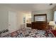 Bedroom features a large dresser with a mirror and ensuite bathroom access at 9642 Meade Ct, Westminster, CO 80031