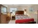 Bedroom featuring a dresser, and bedside tables with views to the yard at 9642 Meade Ct, Westminster, CO 80031