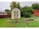 Backyard shows a clean shed with a charming design and surrounding greenery at 9642 Meade Ct, Westminster, CO 80031