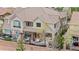 This house includes an outdoor patio with seating, perfect for enjoying the peaceful surroundings of the well-maintained community at 10061 Bluffmont Ct, Lone Tree, CO 80124