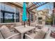 Outdoor patio with a stone facade at 10061 Bluffmont Ct, Lone Tree, CO 80124