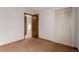 Bedroom with closet and doorframe providing a bright space at 9824 Lane St, Thornton, CO 80260