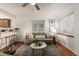 Bright living room with comfy sofa and coffee table at 2028 Perry St, Denver, CO 80212