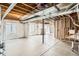 Bright, unfinished basement featuring concrete floors, framed walls, and windows providing plenty of natural light at 4406 Sidewinder Loop, Castle Rock, CO 80108