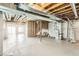 Spacious unfinished basement with concrete floor and walls, offering the opportunity for full customization and expansion at 4406 Sidewinder Loop, Castle Rock, CO 80108