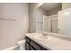 Bathroom featuring a sink and vanity, with a view of the adjacent shower at 4406 Sidewinder Loop, Castle Rock, CO 80108
