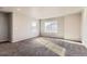 Bright bedroom with soft carpeting and natural light streaming through the windows, creating a cozy atmosphere at 4406 Sidewinder Loop, Castle Rock, CO 80108