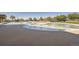 Large swimming pool featuring a shallow sunbathing area and a partially covered pool bottom at 4406 Sidewinder Loop, Castle Rock, CO 80108