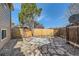 The backyard includes a concrete area and stone pavers at 12995 W Chenango Ave, Morrison, CO 80465