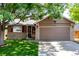 Charming single-Gathering home with a well-maintained lawn, mature trees, and a two-car garage at 12908 Hudson St, Thornton, CO 80241