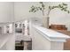 Bright interior view of built-in shelves, wood floors, and tasteful decorations at 12908 Hudson St, Thornton, CO 80241