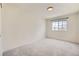 Cozy bedroom with soft carpet and a window to let in natural light at 20112 E Grand Pl, Aurora, CO 80015