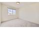 Neutral bedroom with soft carpet and a window to let in natural light at 20112 E Grand Pl, Aurora, CO 80015