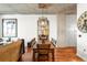 Modern dining room with a large mirror and a wooden table with 6 chairs at 1700 Bassett St # 2216, Denver, CO 80202