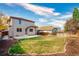 Backyard featuring a patio and mulch beds, and a wood fence at 3339 Blue Grass Cir, Castle Rock, CO 80109