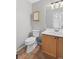 Cozy half-bath with classic vanity and tile flooring at 3339 Blue Grass Cir, Castle Rock, CO 80109