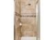 Shower boasts decorative tile, and a handheld shower head at 17611 Hoyt Pl, Parker, CO 80134