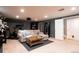 Cozy basement featuring a comfortable seating area and exercise equipment at 3004 S Niagara Way, Denver, CO 80224