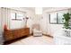 Charming Bedroom features a crib, dresser, and cozy armchair at 3004 S Niagara Way, Denver, CO 80224