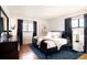 Comfortable main bedroom with ample natural light and modern furnishings at 3004 S Niagara Way, Denver, CO 80224