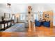 Bright living space with hardwood floors, wood accents, and elegant furniture at 20951 Pleasant Park Rd, Conifer, CO 80433