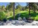 Outdoor patio and dining area features lush natural surroundings at 20951 Pleasant Park Rd, Conifer, CO 80433