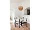 Bright dining area featuring a round table and modern chairs at 5255 Memphis St # 822, Denver, CO 80239