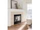 Modern fireplace with a clean, neutral design at 5255 Memphis St # 822, Denver, CO 80239