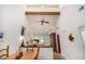 Bright, open floor plan with vaulted ceilings and a ceiling fan in the inviting living area at 9400 E Iliff Ave # 88, Denver, CO 80231