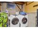 Basement laundry room with a side by side washer and dryer at 5809 S Pearl St, Centennial, CO 80121