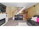 A comfortable living room with a fireplace and cozy seating at 5809 S Pearl St, Centennial, CO 80121
