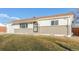 Bright single-story home with a manicured lawn, appealing front entry, and painted accents at 9120 Judson St, Westminster, CO 80031